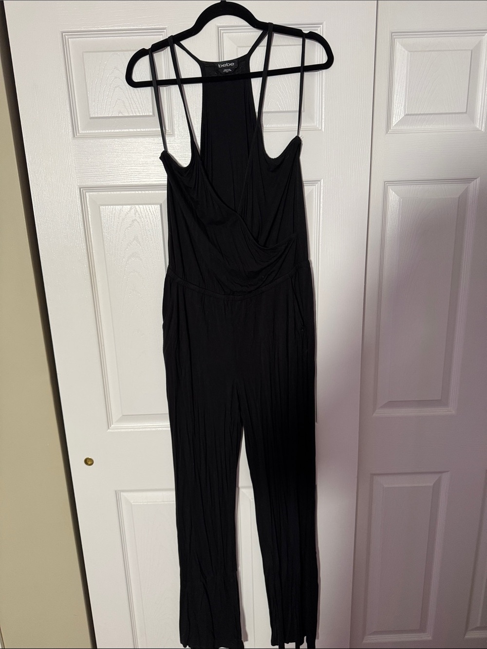 bebe Black Sleeveless Surplice Jumpsuit with Spaghetti Straps